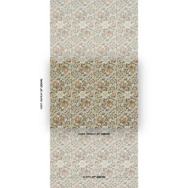 Based on hand-painted ornamental motifs, Garden Guild is an elegant surface-printed wallpaper that evokes the decorative...