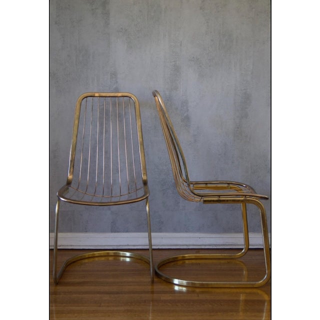 striking set of three vintage Italian Modern cantilever chairs dating from the late 1970s to early 1980s. Constructed from...