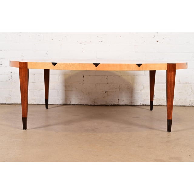 A gorgeous studio crafted Modern Art Deco style coffee table or cocktail table In the manner of Baker Furniture USA, Circa...