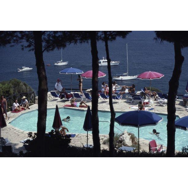 Pellicano Pool 1980 Holidaymakers relax beside the swimming pool of Il Pellicano Hotel in Porto Ercole, Tuscany, August...