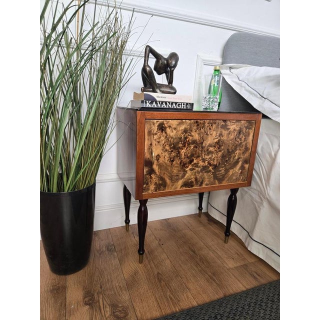 Very elegant and refined Italian 1950s Mid-Century Modern design, pair of bedside tables with decorated bordeaux glass...
