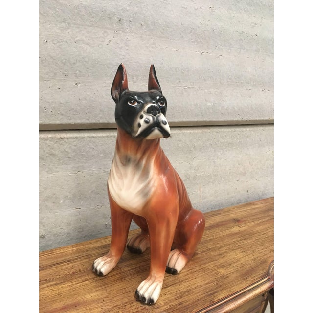 A friendly midcentury boxer made of ceramic.
