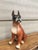 A friendly midcentury boxer made of ceramic.