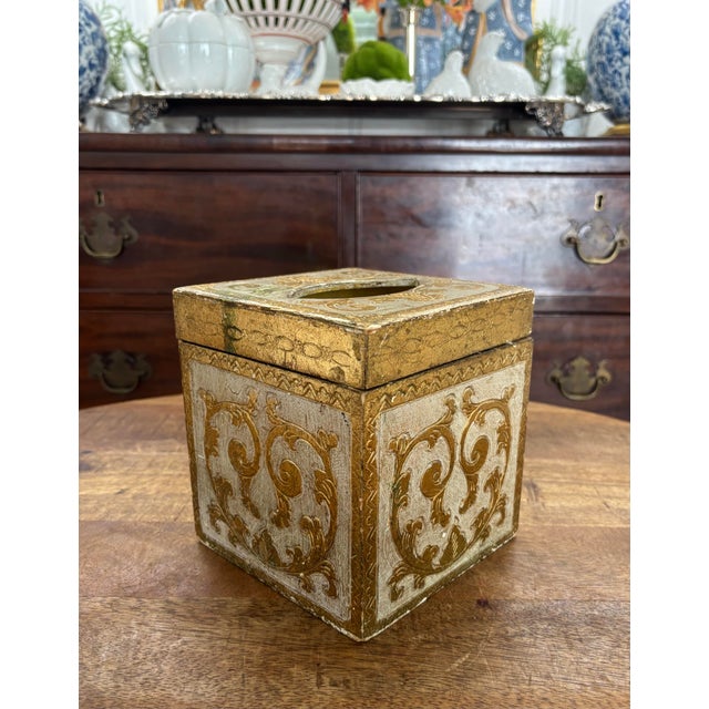 Classic Florentine tissue box cover in gold and off white. Made in Italy with a flip top for easy access/refill. Tradition...