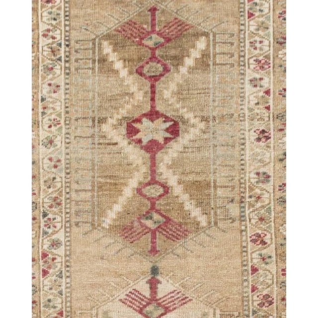 This rug has an Abrash which is a natural change in color that occurs when different dyes are used in a batch of wool and...
