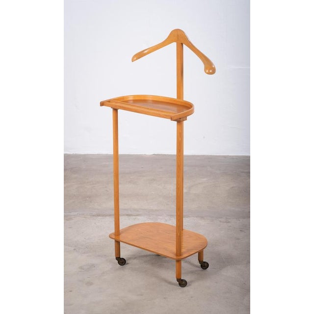 A beautifully crafted 1960s valet stand in solid beech wood, combining timeless Scandinavian design with everyday...