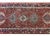 A wonderful vintage Persian Karadja runner with multiple large stylized floral medallions woven amidst a densely oven...