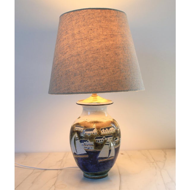 Vintage coastal studio art pottery table lamp. Signed by artist near base. Shade is included. Wired and in working...