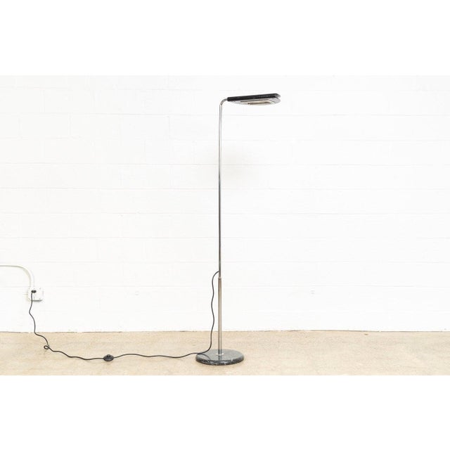 This vintage mid century modern Italian Bruno Gecchelin "Mezzaluna" floor lamp is circa 1970. The sleek space age...