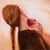 We Contain Multitudes by Ken Cunningham | Oil on cradled panel Woman holding an apple near her neck. For Sale