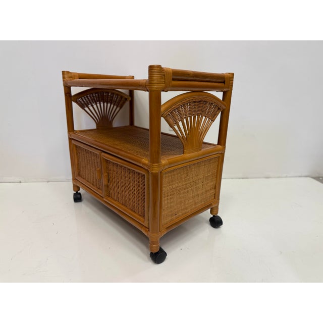 Available for sale: Stunning rattan bar cart, great details. Casters.