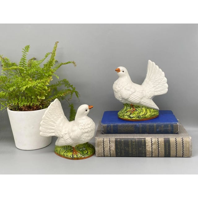 Delightful pair of doves made in Italy. Mid 20th century figurines with maker's mark and number on the undersides. Perfect...