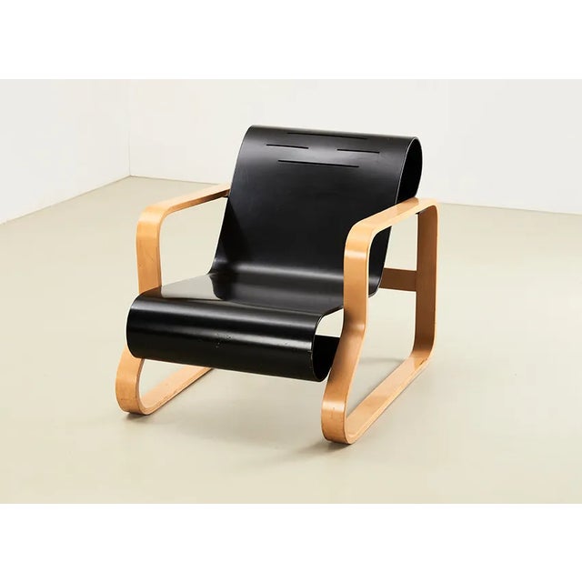 Paimio No 41 lounge chair, designed by Alvar Aalto in 1931 and manufactured by Artek Finland. Although not part of the...