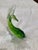 A green dolphin imported by JICO in the1950s. Found the exact fish on Etsy with a red Murano label It was clear without...