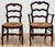 Stunning set of six (6) antique French Country style carved walnut dining chairs. Set features two (2) armchairs and four...