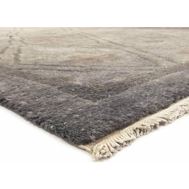 This Vintage Turkish OverDyed Rug is hand woven with wool on a cotton foundation in Turkey. It has been refinished and...