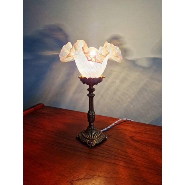 Early 20th-century gilt bronze table lamp with an opalescent glass shade. Fully restored and rewired, compatible with an...