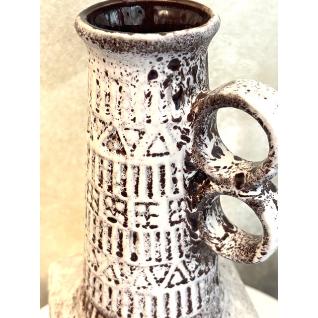 Sculptural vintage vase by Bay Keramik, designed by Ernst Stauber in excellent vintage condition. This piece has an...