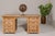 A vintage teak wood kneehole desk with custom bleached finish and eight drawers. Discover the understated elegance of this...