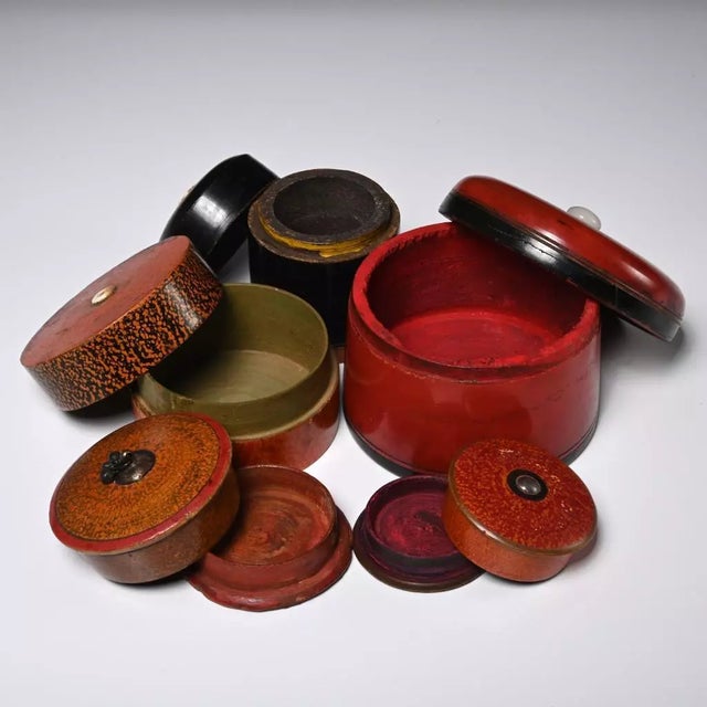 A set of 5 brilliantly lacquered boxes from India. Used for storage of spices and herbs, these boxes are lacquered in...