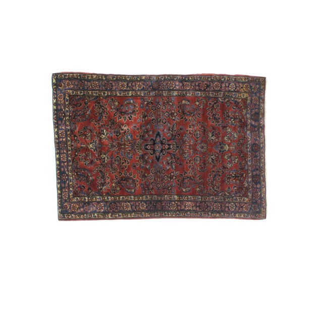This master piece is a wool pile genuine hand woven antique Persian Mohajeran Sarouk rug in mint condition.