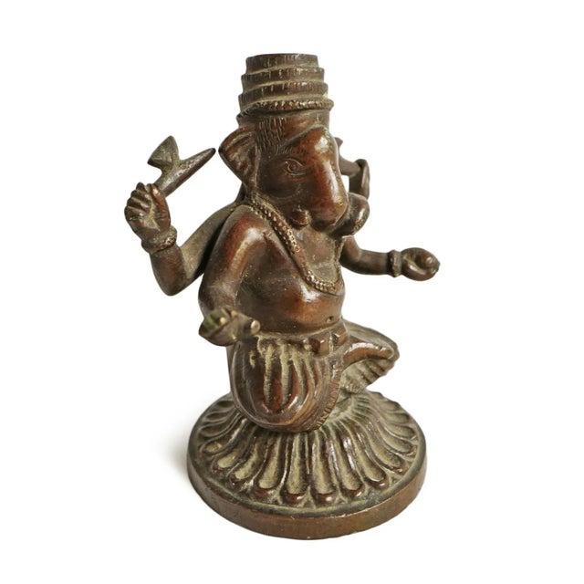 Small antique bronze Ganesha statue. Beautiful intricate details and original aged patina.