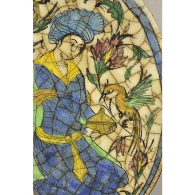 Persian Antique Persian Iznik Qajar Style Ceramic Pottery Oval Tile Figure With Bird C3 For Sale - Image 3 of 9