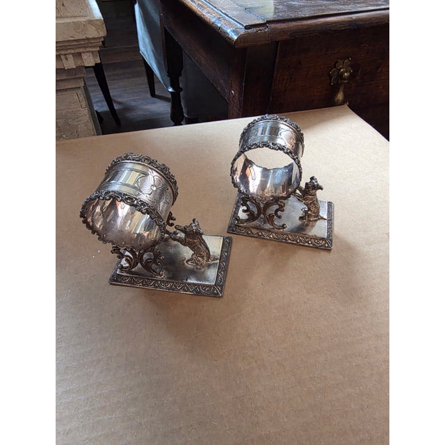 Great looking 19th Century silver plated dog figural napkin rings.