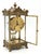 This French clock features beveled glass panels, a skeletal interior, and two opening doors. Made by New Haven Clock...