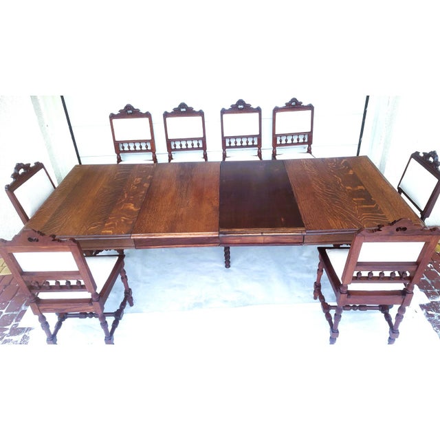 Antique Extending Dining Table Set • circa 1900–1930 • Manor style • 232 cm when extended and 8 chairs. This furniture...