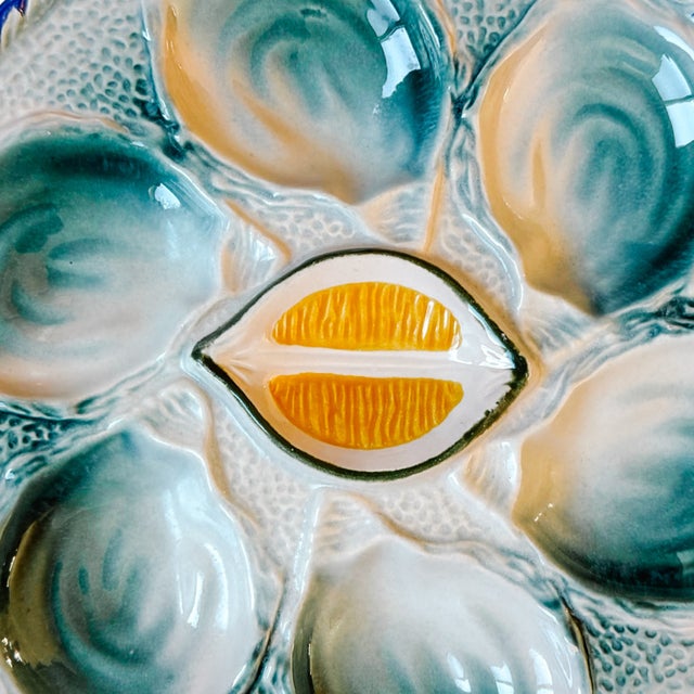Beautiful early to mid-century French majolica oyster plate made at the St. Clement faience factory in France sometime...