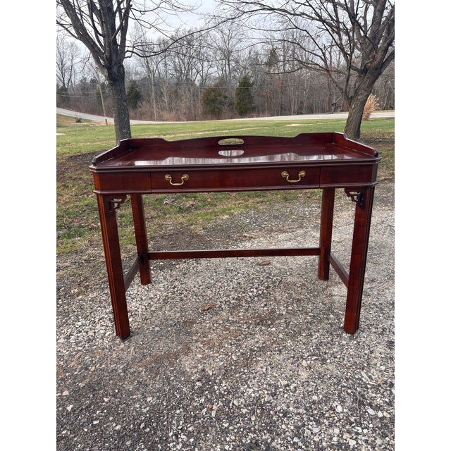 Lovely vintage Lane Furniture Chinese Chippendale writing desk. It features one long drawer with a brass handle, brass...