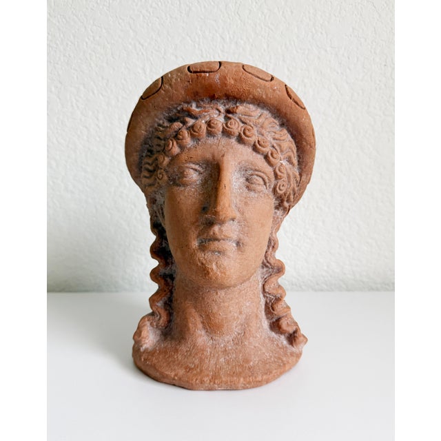 Late 20th-century replica terracotta bust statue of an Estrucan-style female figure. Marked Made in Italy.