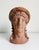 Late 20th-century replica terracotta bust statue of an Estrucan-style female figure. Marked Made in Italy.