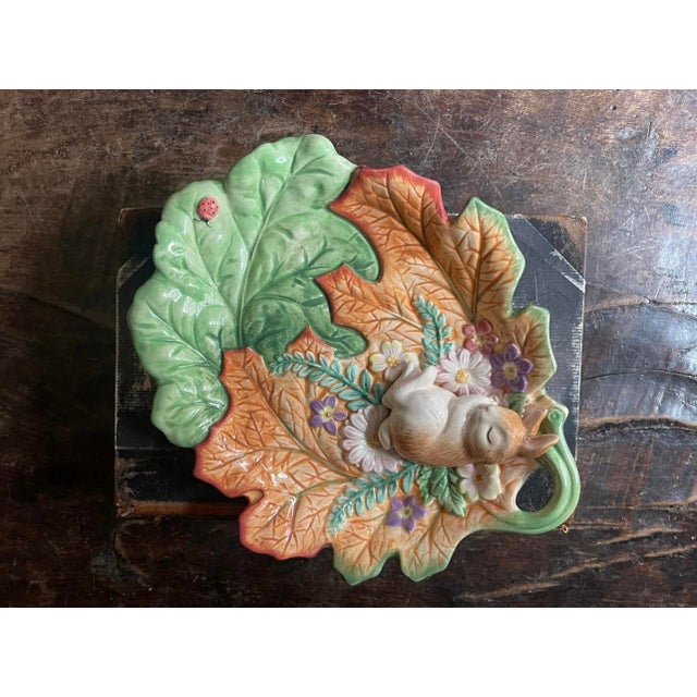 The sweetest bunny rabbit dish from Fitz and Floyd, Majolica in style, a tiny bunny sleeps with his paws as a pillow, in a...