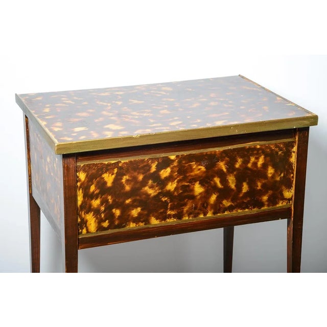 This is a rare and fine, Lacquered Tortoiseshell Faux Painted Side Table by Henkel-Harris. This charming small chest side...