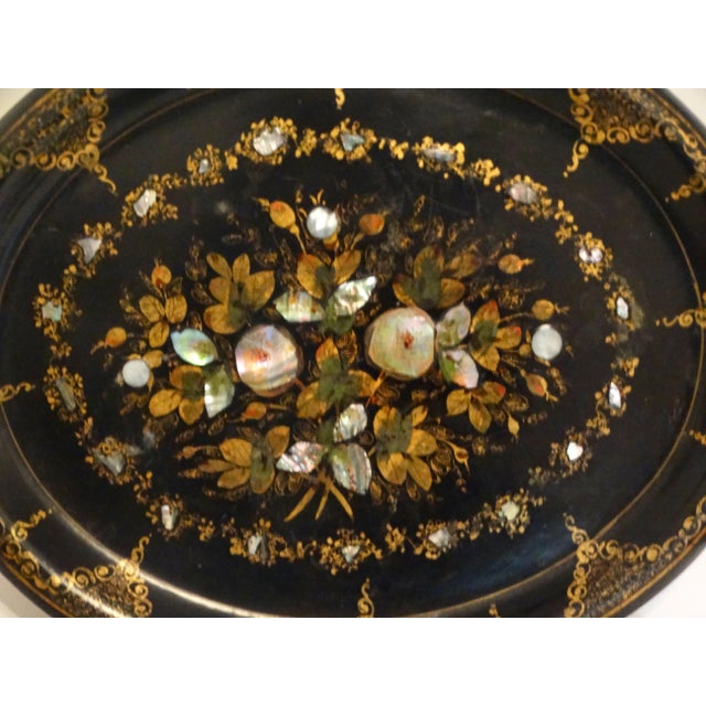 19th-Century English oval papier-mâché chinoiserie serving tray.. It is handcrafted with lovely mother of pearl and...