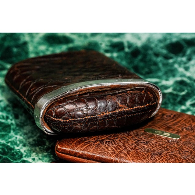 A handsome antique English Victorian cigar case, crafted from leather with a richly textured surface that immediately...