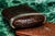 A handsome antique English Victorian cigar case, crafted from leather with a richly textured surface that immediately...