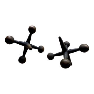 Mid-Century Oversized Cast Iron Jacks - a Pair For Sale