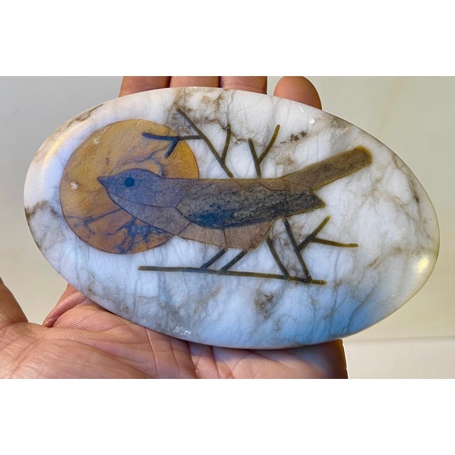 A beautifully hand-crafted trinket or jewelry box in white marble. Featuring an organically crafted oval shape and the lid...