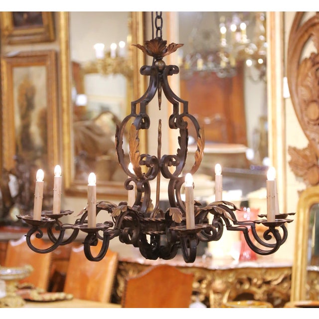 Bring elegant Old World character to a dining room, entry, or powder room with this beautifully hand forged French...