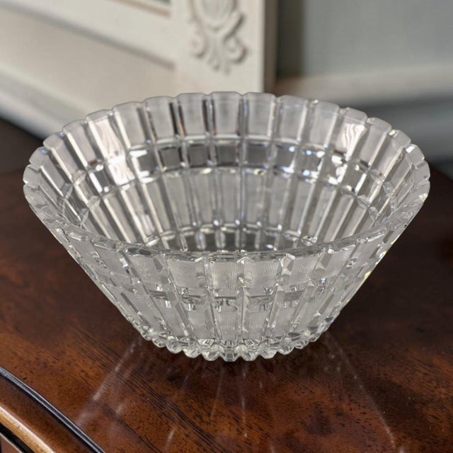 This stunning mid-century hand-cut 24% heavy lead crystal oval center bowl features geometric panel cuts in a clear color,...