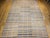 A striking 19th century American Amish rag rug of room size, composed of three expertly joined woven runners to form one...