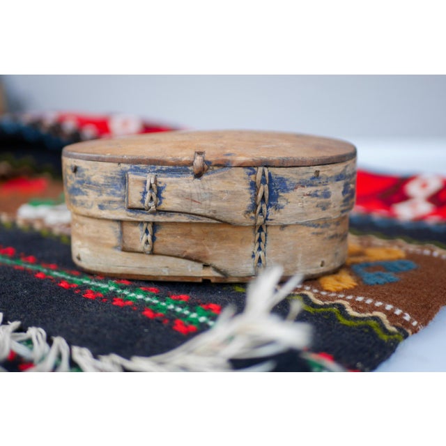 A beautifully rare Scandinavian antique bent wooden box known as a "Svepask" from Sweden, one can tell that this object...