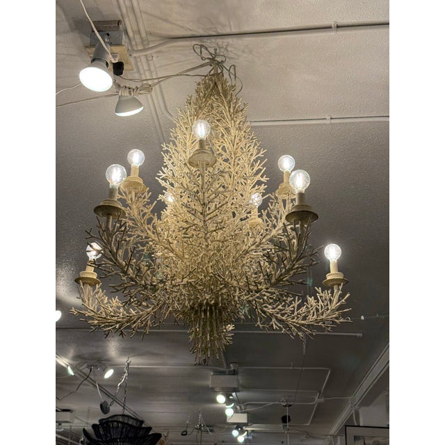 Design Plus Gallery presents a 10-Light Metal Chandelier designed by Pride Sasser for Cosona Manufacturing. The sculptural...