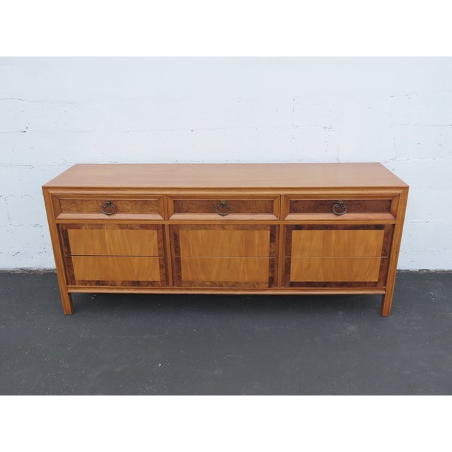 This magnificent Dresser is made of wood, solid wood, mahogany, burlwood, veneer, solid oak, and metal. The Dresser was...