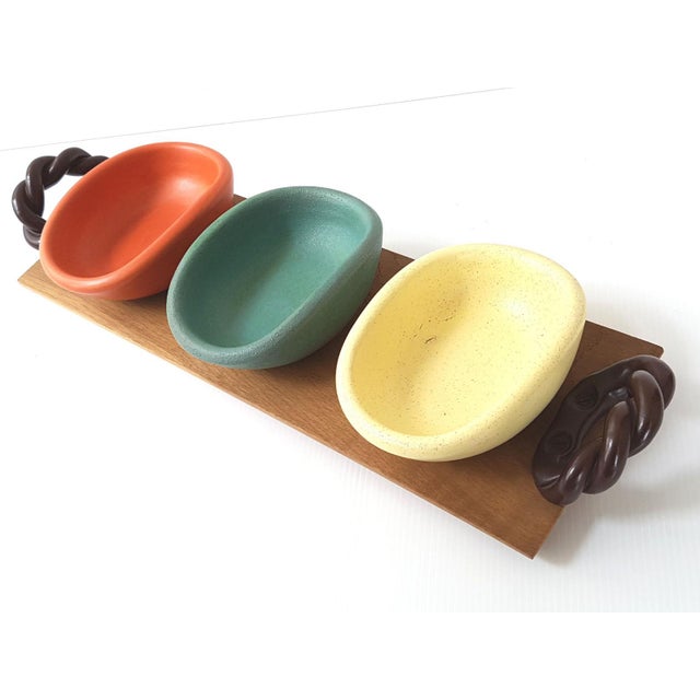 Very good condition. Minor signs of use. The tray measures 54 x 15.5 cm. One ramekin measures 16 x 12 cm. Height 6.5 cm....