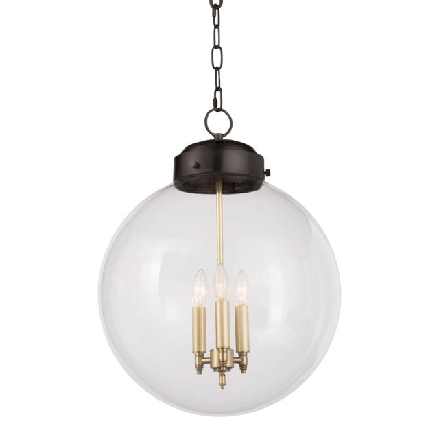 Regina Andrew Globe Pendant in Oil Rubbed Bronze and Natural Brass For Sale