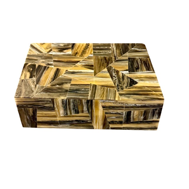 An elegant bone mosaic decorative box attributed to Maitland Smith, dating from the 1970s. The exterior is meticulously...